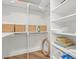 Spacious closet with well-organized shelving, ideal for storage and organization at 5700 Escondida S Blvd # 401, St Petersburg, FL 33715