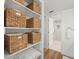 Walk-in closet with organized shelves and hanging storage at 5700 Escondida S Blvd # 401, St Petersburg, FL 33715