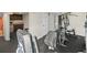 Well-equipped gym area with machines and a refreshment station for convenient workouts at 5700 Escondida S Blvd # 401, St Petersburg, FL 33715