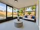Comfortable sunroom with furniture and view to backyard at 5703 Andrea Dr, Holiday, FL 34690