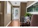 Inviting entryway with hardwood floors and natural light, leading into the main living spaces at 6028 Central Ave, New Port Richey, FL 34653