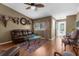 Inviting living room featuring hardwood floors and ample natural light at 6028 Central Ave, New Port Richey, FL 34653