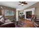 Comfortable living room with hardwood floors, fireplace, and a relaxing atmosphere at 6028 Central Ave, New Port Richey, FL 34653
