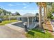 Charming single-story home with a covered carport and neat landscaping at 6726 Udell Ln, Hudson, FL 34667