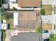 Aerial view of a home showing roof and lot with storage shed at 6915 N Hubert Ave, Tampa, FL 33614