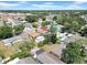 This home has a lovely fenced in yard with mature trees and a small outdoor living space at 6915 N Hubert Ave, Tampa, FL 33614