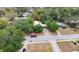 Overhead view of the house, driveway, and landscaping at 810 W River Dr, Temple Terrace, FL 33617