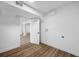 A partial view of the basement features an open door and a utility hook up at 810 W River Dr, Temple Terrace, FL 33617