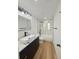 Renovated bathroom with double vanity and modern fixtures at 810 W River Dr, Temple Terrace, FL 33617
