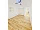 Bedroom with ceiling fan, closet, and hallway view at 810 W River Dr, Temple Terrace, FL 33617