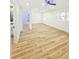 Spacious living room with wood floors, recessed lighting, and a ceiling fan at 810 W River Dr, Temple Terrace, FL 33617