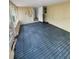Cozy sunroom with screened windows and tile flooring, perfect for relaxing at 810 W River Dr, Temple Terrace, FL 33617