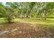 Secluded home amidst a vibrant, wooded landscape, perfect for those seeking privacy and a connection with nature at 8270 Oakgren Rd, Brooksville, FL 34601