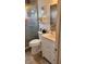 Bathroom featuring a white vanity, toilet, framed art and glass shower at 10040 38Th N Way, Pinellas Park, FL 33782