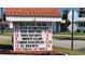 Community sign showing scheduled events and activities at 10040 38Th N Way, Pinellas Park, FL 33782