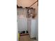 Functional laundry area with appliances and shelving for storage at 10040 38Th N Way, Pinellas Park, FL 33782