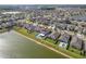 Aerial view with the home marked and its location on a lake and fenced in backyard with pool at 10313 Wine Press Ave, Riverview, FL 33578