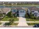 Beautifully landscaped home with a lake view in a well-planned community at 10313 Wine Press Ave, Riverview, FL 33578