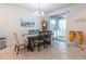 Inviting dining room with natural light; connects to the kitchen and living spaces for easy entertaining at 10313 Wine Press Ave, Riverview, FL 33578