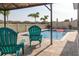 Outdoor oasis featuring a pool, gazebo, and Adirondack chairs for ultimate relaxation at 10313 Wine Press Ave, Riverview, FL 33578
