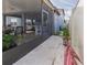 View of the screened-in patio with outdoor furniture, offering a seamless transition to the outdoors at 10313 Wine Press Ave, Riverview, FL 33578
