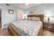 Inviting bedroom with coastal decor, featuring a spacious closet and a calming ambiance at 105 Woodlake Wynde, Oldsmar, FL 34677