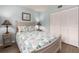 Charming bedroom featuring coastal-themed decor, ample closet space, and a relaxing atmosphere at 105 Woodlake Wynde, Oldsmar, FL 34677