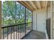 Enjoy the outdoors from this screened in balcony with wooden floorboards and peaceful nature views at 11901 4Th N St # 8207, St Petersburg, FL 33716