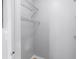 This is an empty closet with white walls and wire shelving, ready for your personalization and organization at 11901 4Th N St # 8207, St Petersburg, FL 33716