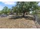 Park-like community green space with mature trees and a park bench for relaxing and enjoying nature at 11901 4Th N St # 8207, St Petersburg, FL 33716