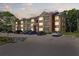 Exterior view of the apartment building featuring balconies, street parking and beautiful architecture at 11901 4Th N St # 8207, St Petersburg, FL 33716