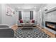 Inviting living room features fireplace, comfortable seating, and stylish decor at 11901 4Th N St # 8207, St Petersburg, FL 33716