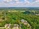 Property surrounded by lush greenery and homes at 12212 Mcmullen Loop, Riverview, FL 33569