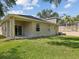 Exterior with a well-maintained lawn at 12212 Mcmullen Loop, Riverview, FL 33569