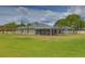 Aerial view of backyard with screened pool and patio at 12501 Palomino Ct, Tampa, FL 33626