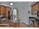 Kitchen with stainless steel appliances, granite countertops and tile flooring at 12501 Palomino Ct, Tampa, FL 33626