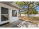 Backyard with a patio, shed, and mature trees, providing ample shade and outdoor space at 133 43Rd Ne Ave, St Petersburg, FL 33703
