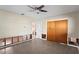 Bedroom with ceiling fan, closet, and doorway to the bathroom at 133 43Rd Ne Ave, St Petersburg, FL 33703