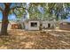 Charming home with lush landscaping, showcasing its inviting curb appeal at 133 43Rd Ne Ave, St Petersburg, FL 33703