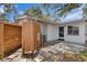 Charming home exterior with a private outdoor shower and well-maintained landscaping at 133 43Rd Ne Ave, St Petersburg, FL 33703