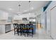 Bright kitchen with stainless steel appliances, granite countertops, and an eat-in island at 13404 Fladgate Mark Dr, Riverview, FL 33579