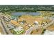 An aerial view of the park featuring a skate park, pump track, splash pad, and other activities at 13916 Wellesford Way, Tampa, FL 33624