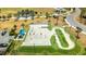 Aerial view of the park showing the skate park and pump track at 13916 Wellesford Way, Tampa, FL 33624
