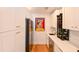 Butler's pantry offers ample storage, a wine cooler, and a convenient sink at 13916 Wellesford Way, Tampa, FL 33624