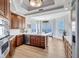 Well-equipped kitchen with stainless steel appliances, custom cabinets, granite countertops and a view at 140 Riviera Dunes Way # 1203, Palmetto, FL 34221