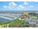 Expansive marina view featuring numerous boats docked near luxury condos with waterfront views at 140 Riviera Dunes Way # 1203, Palmetto, FL 34221