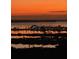 Sunset view with water reflection at 140 Riviera Dunes Way # 1203, Palmetto, FL 34221