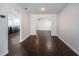 Dining room with hardwood floors and open to the kitchen at 1402 Oleander Dr, Tarpon Springs, FL 34689