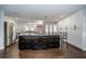Kitchen with island, stainless steel appliances, and hardwood floors at 1402 Oleander Dr, Tarpon Springs, FL 34689