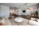 Spacious living room featuring hardwood floors and an open floor plan at 1402 Oleander Dr, Tarpon Springs, FL 34689